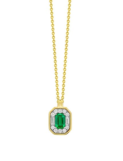 Emerald and Diamond Halo Necklace. Emerald cut Emerald in the center with a halo of round diamonds with one baguette diamond on the long sides all framed in yellow gold in an octagon shape. Chain included